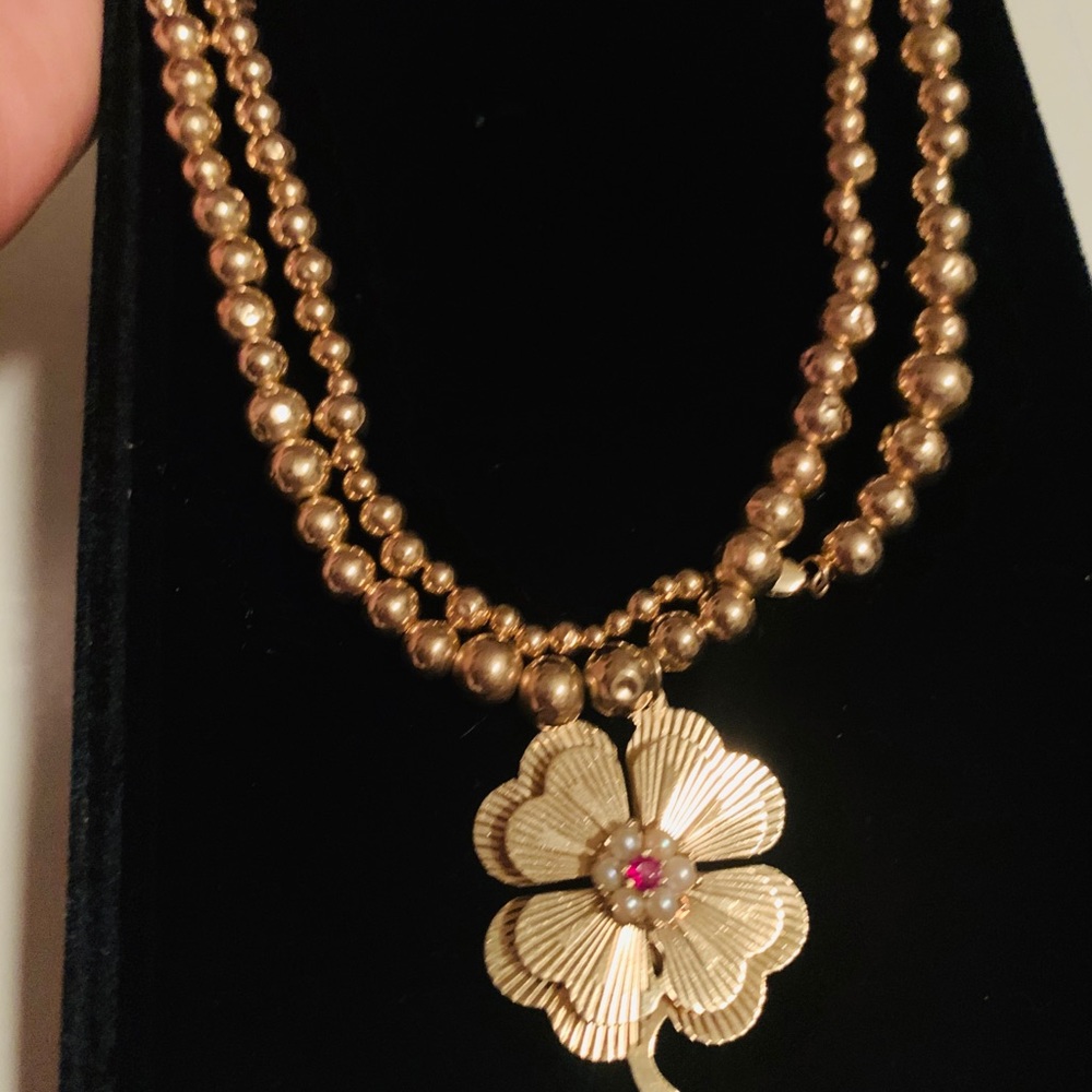 14k solid gold bead necklace with a clover pendant
